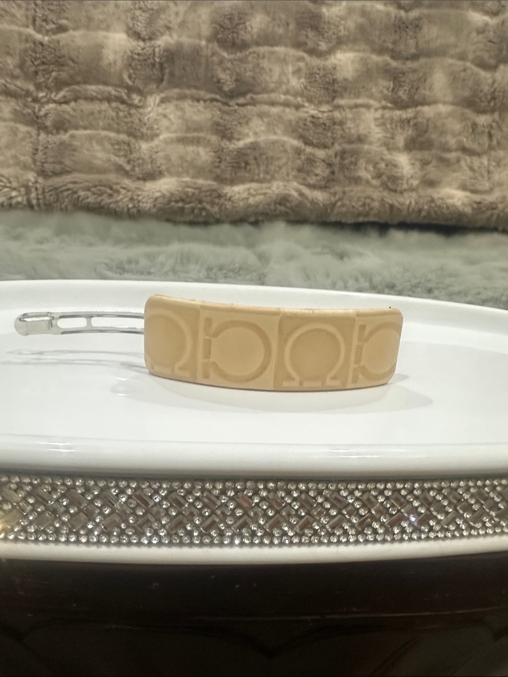 SALVATORE FERRAGAMO Beige leather Logo Embossed Hair Clip.